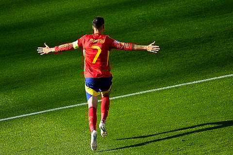 Alvaro Morata celebrates after scoring the opening goal